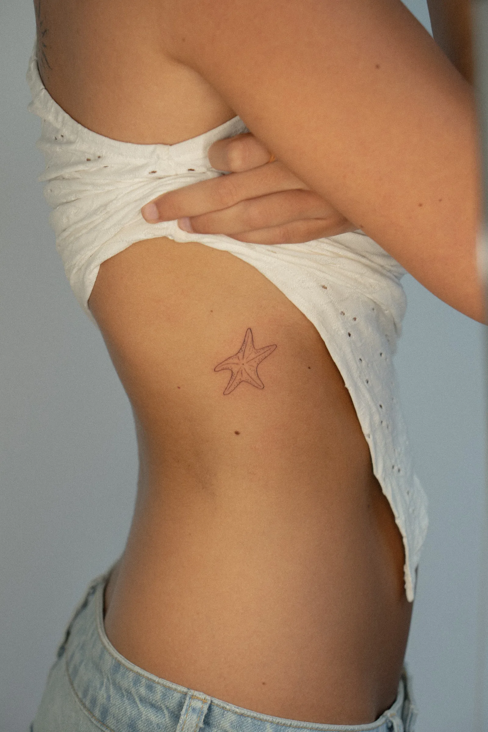 tatuaje fine line estrella pequeña precisa Maflex Santander